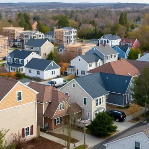 A view of homes in a Massachusetts neighborhood with construction signs visible.
