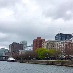 View of Boston's waterfront with clouds and wind indicating changing weather conditions