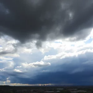 Storm clouds over Boston representing heat advisory conditions