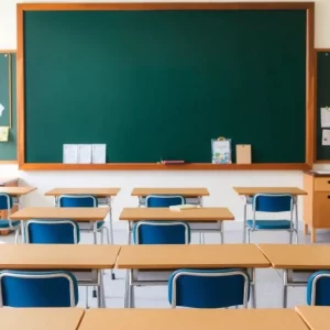 Empty classroom highlighting K-12 funding issues in Massachusetts