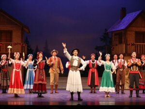 A diverse cast performing Black Nativity on stage)