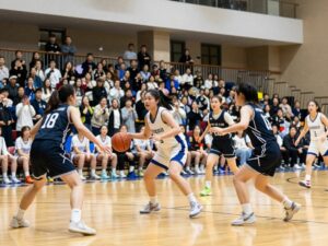 Boston University women's basketball team competing in a game